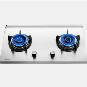 Two-burner stainless steel gas cooktop with lit blue flames and centered control knobs.