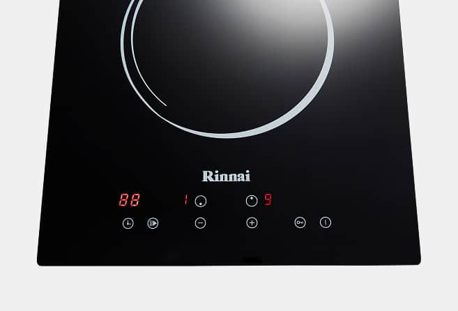 Rinnai induction cooktop control panel with circular burner ring and red digital display digits