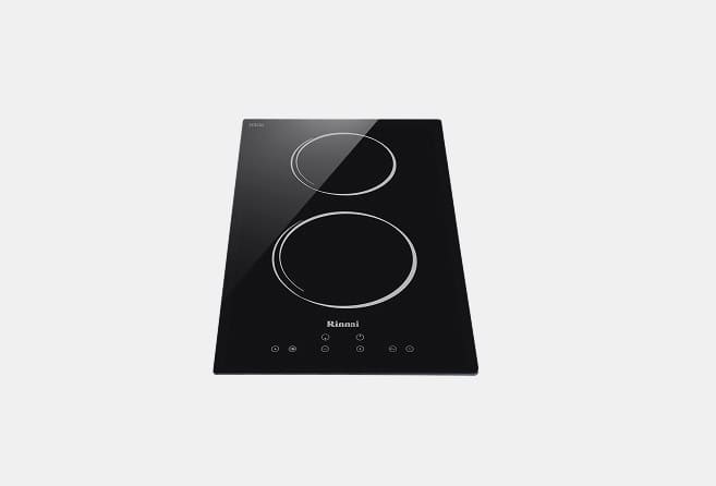 Black, two-burner electric cooktop with red-glowing circular heating coils and touch controls at the bottom