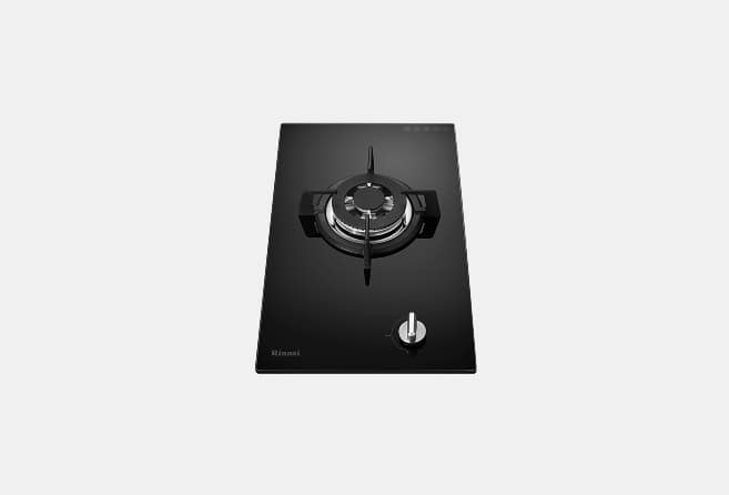 Black glass gas cooktop with a single burner and chrome control knob on the right side.