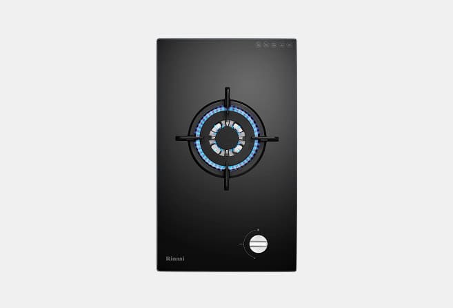 Black glass gas cooktop with a single circular burner lit in blue flame and a control knob at the lower right; brand 'Rinnai' visible.