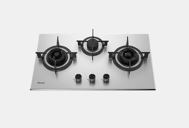 Stainless steel gas cooktop with three burners and front control knobs, clean minimalist design.
