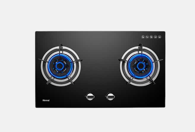 Black glass gas cooktop with two blue-flame burners and front control knobs (Rinnai).