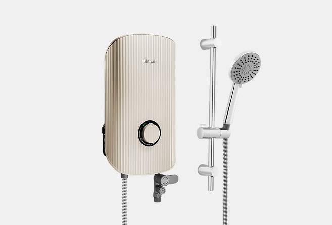 Beige wall-mounted electric water heater with a round control knob and a handheld shower head on a rail system.