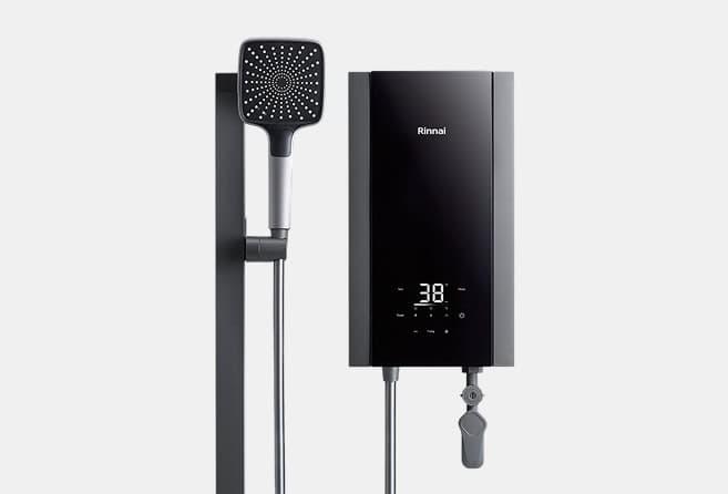 Wall-mounted Rinnai tankless water heater with a digital display and a connected handheld shower head beside it.