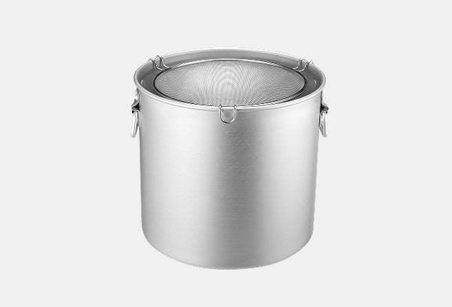 Stainless steel flour sifter with a mesh screen on top and two side handles.