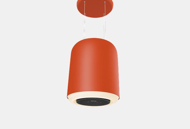 Orange cylindrical pendant lamp suspended by two cords from a ceiling canopy, against a light background.