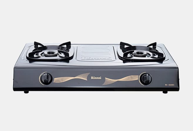 Two-burner gas stove with front knobs and metallic finish, branded Rinnai.
