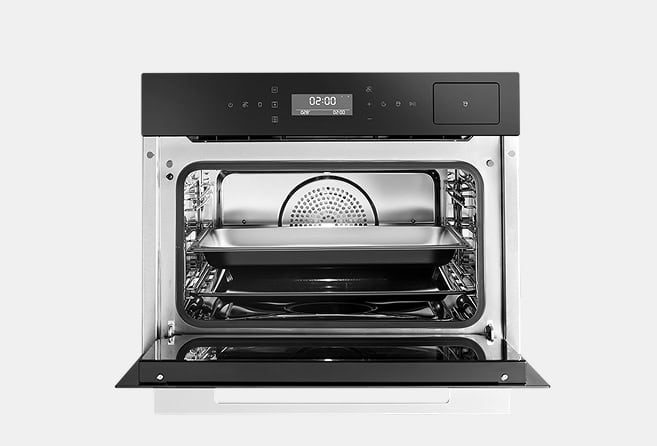 Front view of a stainless steel countertop oven with the door open, showing racks and a baking tray inside.