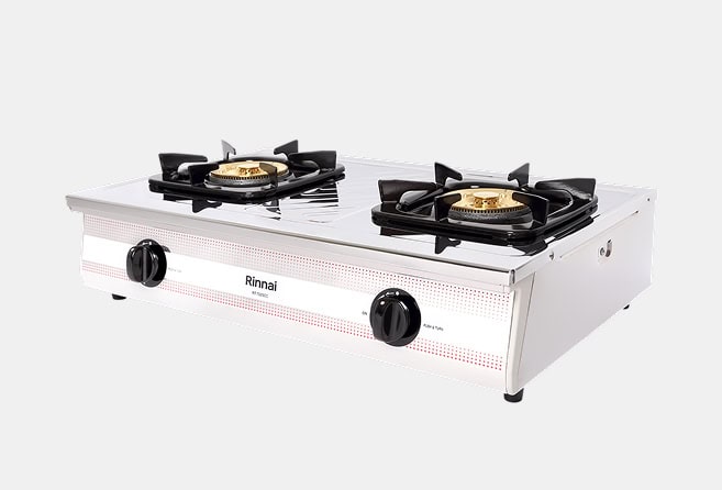 Stainless steel, two-burner gas cooktop with black control knobs and brass burner heads (Rinnai).